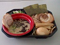 【写真 : つけ麺とんこつブラックスパイシー + トッピング5種(ネギ、のり、あぶりチャーシュー、メンマ、煮たまご)】